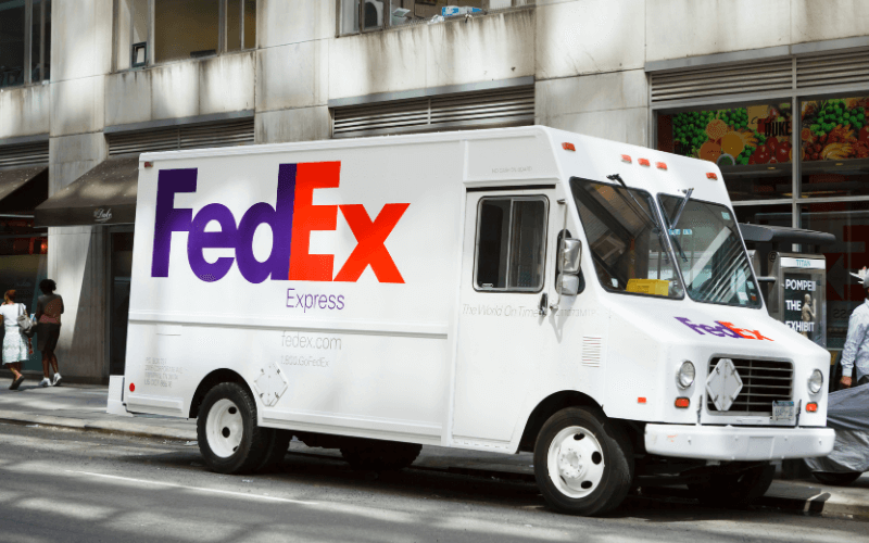 Image of a FedEx truck parked on the street.